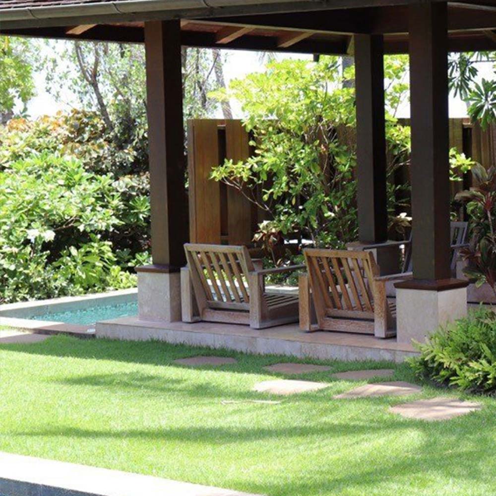 image of landscaped yard near pool cabana